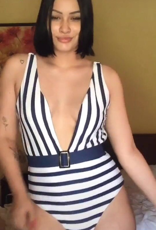 1. Hot Valeria Figueroa Shows Cleavage in Striped Swimsuit