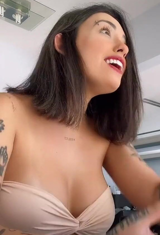 1. Sexy Vitoria Marcilio Shows Cleavage in Beige Bikini Top