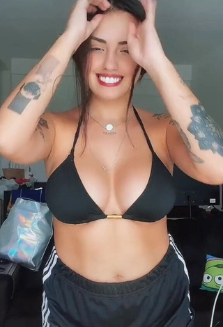 1. Desirable Vitoria Marcilio Shows Cleavage in Black Bikini Top and Bouncing Boobs