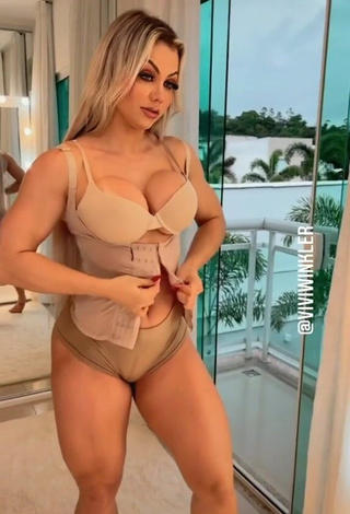 Hot Vivi Winkler Shows Cleavage in Beige Bra