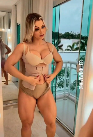 3. Hot Vivi Winkler Shows Cleavage in Beige Bra