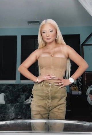 Sexy Alabama Barker Shows Cleavage in Beige Corset