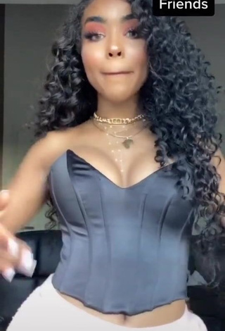 Sexy Alicia Awa Shows Cleavage in Black Corset