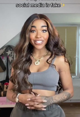 1. Cute Alicia Awa Shows Cleavage in Grey Crop Top