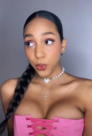 Desirable Alisha Kone Shows Cleavage in Pink Corset (Side Boob)