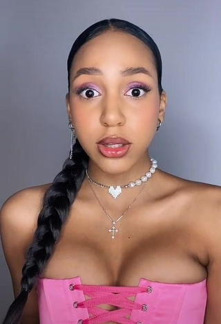 4. Desirable Alisha Kone Shows Cleavage in Pink Corset (Side Boob)