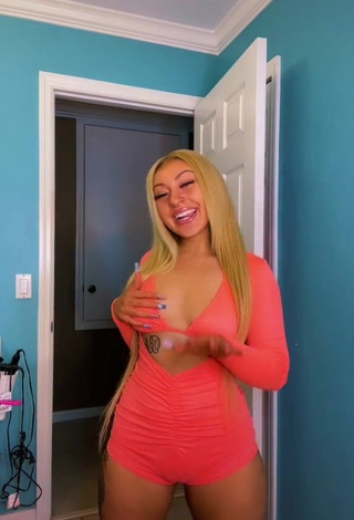 4. Desirable Alli Haas Shows Cleavage in Orange Overall