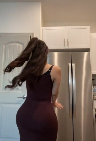 3. Hot Alondra Ortiz Shows Cleavage in Brown Dress