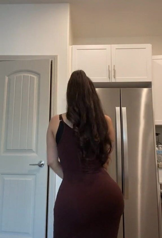 4. Hot Alondra Ortiz Shows Cleavage in Brown Dress