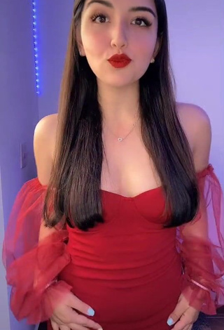 Sexy Andyy Tok Shows Cleavage in Red Dress