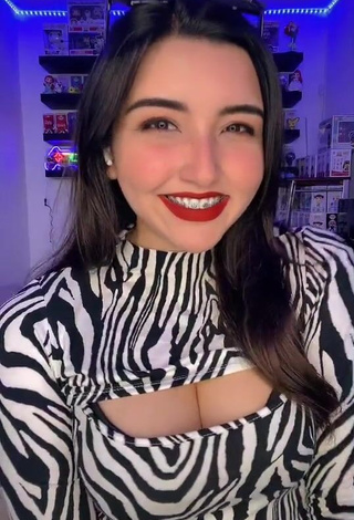 1. Desirable Andyy Tok Shows Cleavage in Zebra Dress