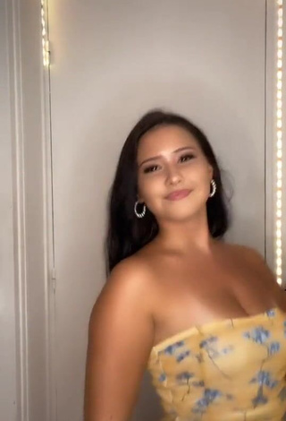 4. Beautiful Anissa Shows Cleavage in Sexy Floral Dress