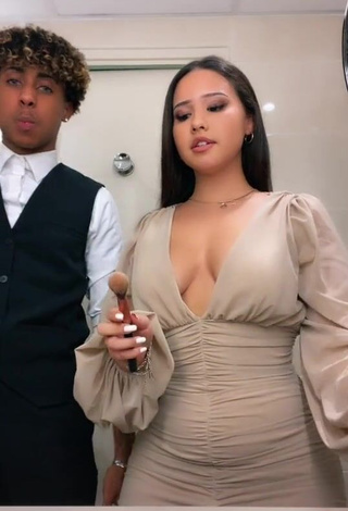 4. Desirable Anissa Shows Cleavage in Dress (Side Boob)