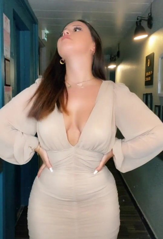 Sweetie Anissa Shows Cleavage in Dress