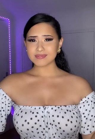 1. Anissa Shows her Inviting Cleavage