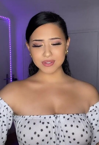 Anissa Shows her Inviting Cleavage