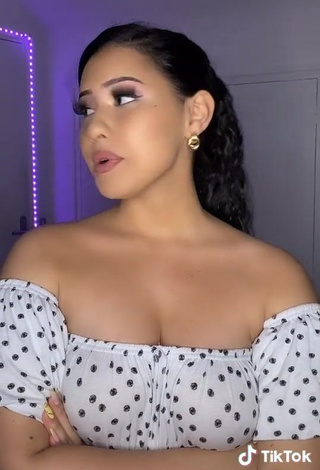 4. Anissa Shows her Inviting Cleavage