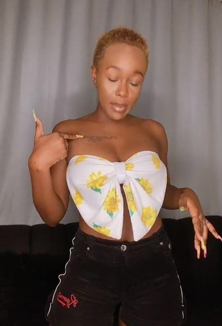 Hot Azziad Nasenya Shows Cleavage in Floral Tube Top