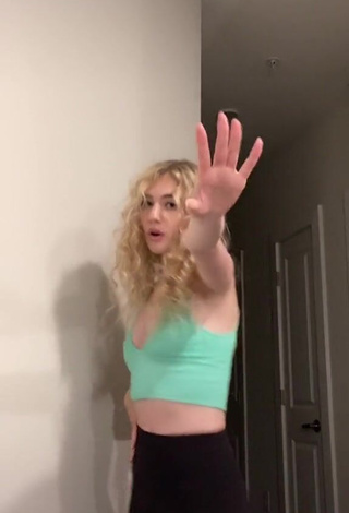 1. Hot Kennedy Shows Cleavage in Light Green Crop Top