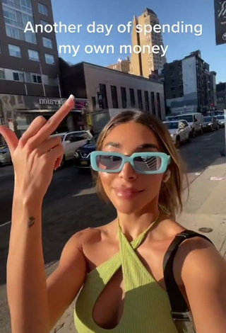 4. Hottie Chantel Jeffries Shows Cleavage in Lime Green Crop Top in a Street