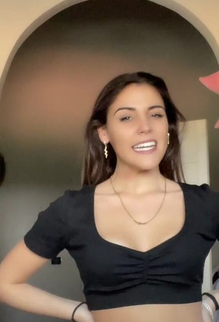 1. Sexy Clarissa Rotelli Shows Cleavage in Black Crop Top