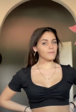 Sexy Clarissa Rotelli Shows Cleavage in Black Crop Top