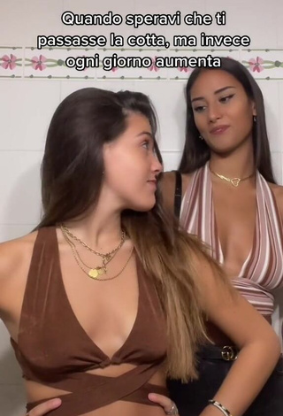 1. Hottie Clarissa Rotelli Shows Cleavage in Brown Crop Top