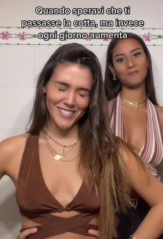 Hottie Clarissa Rotelli Shows Cleavage in Brown Crop Top