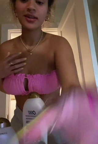 3. Hot Corinne Carr Shows Cleavage in Pink Bikini Top (Side Boob)