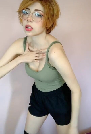 Sweet Didi Shows Cleavage in Cute Olive Top