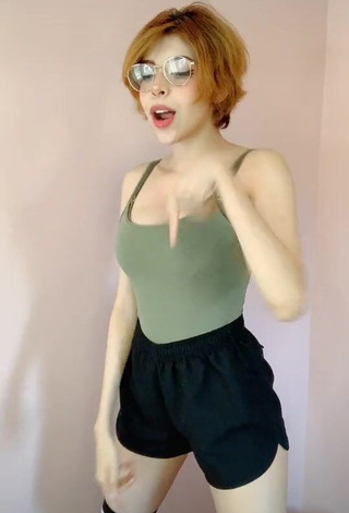 Cute Didi Shows Cleavage in Olive Top