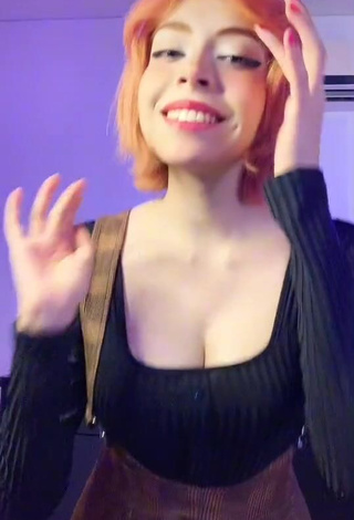 Beautiful Didi Shows Cleavage in Sexy Black Top