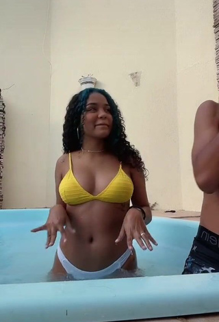 1. Sexy Radija Pereira Shows Cleavage in Bikini at the Swimming Pool