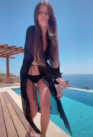 3. Hot Kasia Bożek Shows Cleavage in Black Bikini