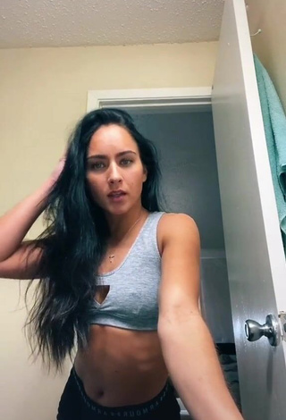 1. Hot Gabi Butler Shows Cleavage in Grey Sport Bra (Side Boob)