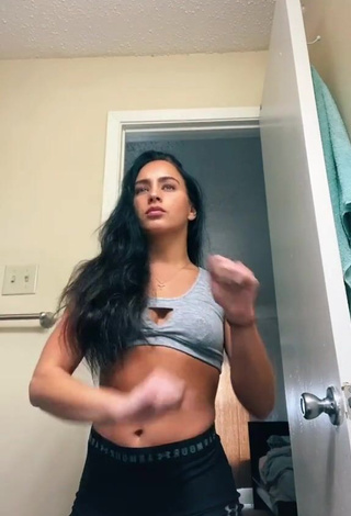 3. Hot Gabi Butler Shows Cleavage in Grey Sport Bra (Side Boob)