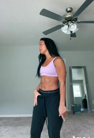 Desirable Gabi Butler Shows Cleavage in Violet Sport Bra