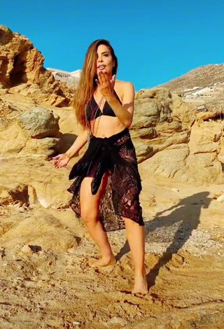 Hot Gloria Trevi Shows Cleavage in Black Bikini Top