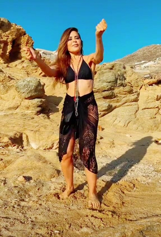 3. Hot Gloria Trevi Shows Cleavage in Black Bikini Top