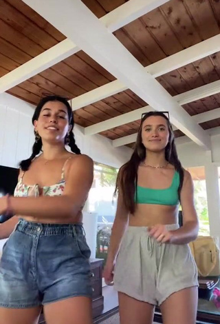 4. Sexy Hannah Meloche Shows Cleavage in Green Bikini Top