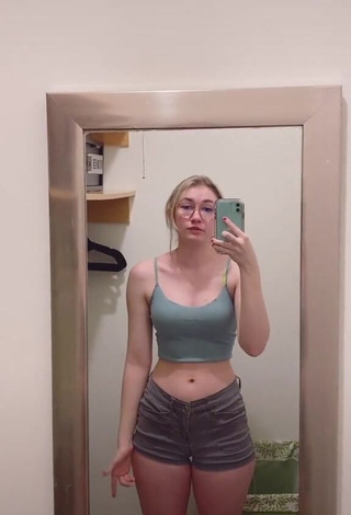 Sweetie Sydney Shows Cleavage in Olive Crop Top