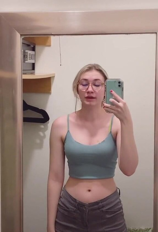 3. Sweetie Sydney Shows Cleavage in Olive Crop Top