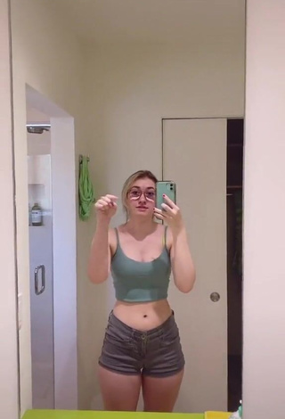 1. Cute Sydney Shows Cleavage in Olive Crop Top