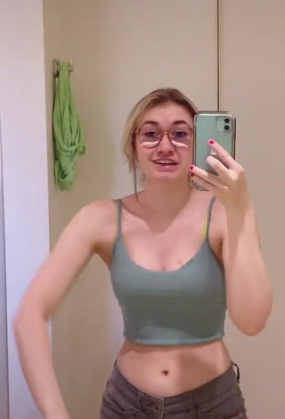 4. Hottie Sydney Shows Cleavage in Olive Crop Top