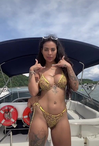 1. Beautiful Pamella Fuego Shows Cleavage in Sexy Leopard Bikini on a Boat