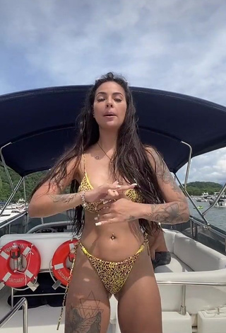 3. Beautiful Pamella Fuego Shows Cleavage in Sexy Leopard Bikini on a Boat