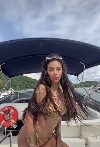 4. Beautiful Pamella Fuego Shows Cleavage in Sexy Leopard Bikini on a Boat