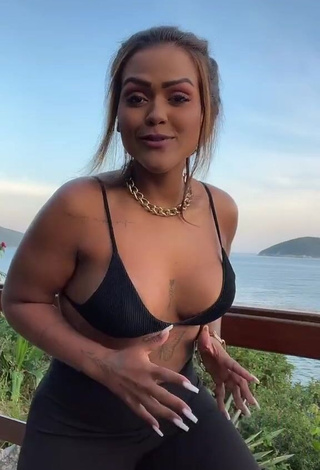 Sexy Camila De Almeida Loures Shows Cleavage in Black Bikini Top on the Balcony