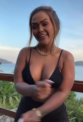 3. Sexy Camila De Almeida Loures Shows Cleavage in Black Bikini Top on the Balcony