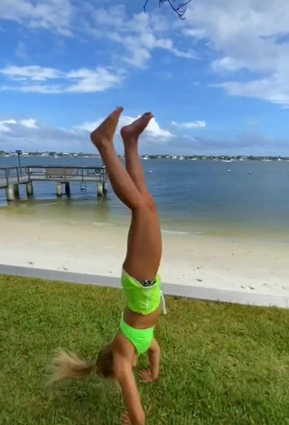 3. Sexy Cassidy Thompson in Bikini Top at the Beach while doing Fitness Exercises